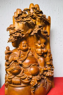 tượng di lặc ngồi gốc tùng - góc bên trái